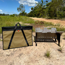Load image into Gallery viewer, Portable fir pit canvas bag next to grill on the ground
