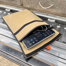 Load image into Gallery viewer, Induction cooker in padded canvas bag for travel.