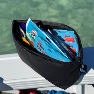 Black canvas bag with Z-MAN fishing tackle soft plastics 