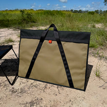 Load image into Gallery viewer, Canvas hotplate bag closed on the sand