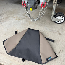 Load image into Gallery viewer, tow hitch cover laying flat on ground next to do35 coupling 