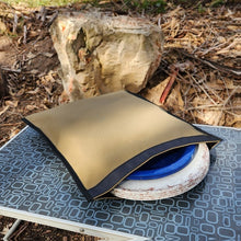 Load image into Gallery viewer, Canvas plate bag half open with a stack of plates inside it.