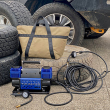 Load image into Gallery viewer, Bag for Thumper Max tire inflator with hoses and a bag on a car tire.