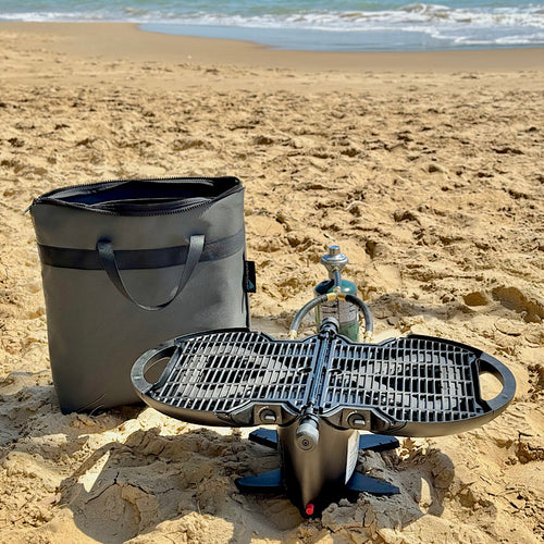 Nomadiq bbq next to canvas carry bag 