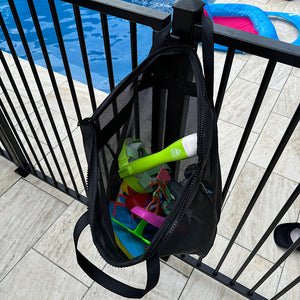 Pool toys draining inside a mesh storage bag 