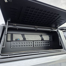 Load image into Gallery viewer, Rod Sleeve inside a 4WD canopy mounted to molle panel
