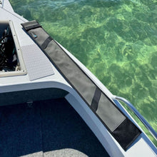 Load image into Gallery viewer, Grey Rod Sleeve  with fishing od inside on the edge of a boat