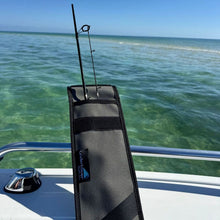 Load image into Gallery viewer, A black and gray fishing rod holder case on a boat with clear blue-green ocean water in the background