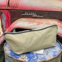 Load image into Gallery viewer, Khaki rope bag zipped up sitting on a drum