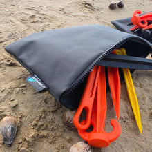 Load image into Gallery viewer, Peg bag full of sand pegs