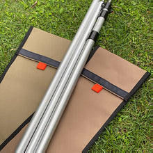 Load image into Gallery viewer, Telt pole on top of canvas pole storage bags