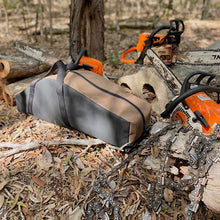 Load image into Gallery viewer, Stihl chainsaws next to a canvas carry bag