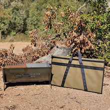 Load image into Gallery viewer, Outdoor grill and carrying case with 'Australian Made' branding in a natural setting.