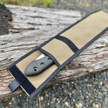 Load image into Gallery viewer, Knife sheath with a knife inside on a wooden surface