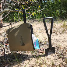 Load image into Gallery viewer, canvas bag hanging from tree next to shovel 