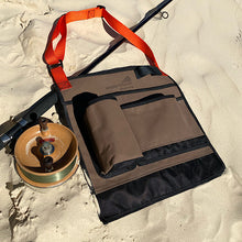 Load image into Gallery viewer, Bag on sand with rod and reel