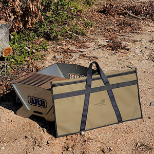 Canvas bag leaning on fire pit