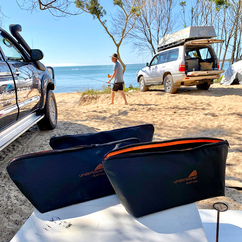3 canvas bags on table