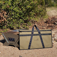 Load image into Gallery viewer, fire pit and storage bag next to a bush